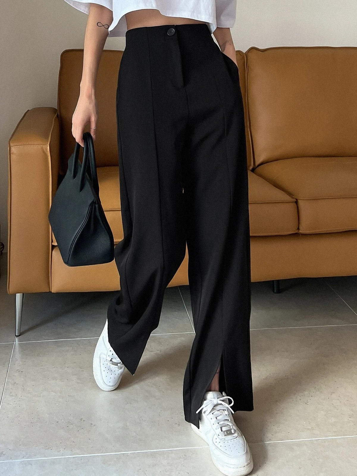 PANTALÓN ANCHO CON ABERTURA